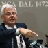 Banca Monte dei Paschi di Siena's newly appointed Chairman Profumo gestures during a news conference at the company's headquarters in Siena