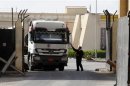 Truck loaded with building materials drives at the Rafah crossing with Egypt, in the southern Gaza Strip