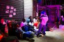 Haitians queue up at night to legalize their status at the Interior Ministry in Santo Domingo, on June 16, 2015