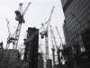 Cranes are seen on a construction site in The City of London