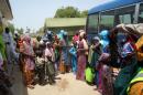 Some of the 275 women and children rescued from Boko Haram during military operations leave the Malkohi camp outside the Adamawa state capital, Yola, in northeast Nigeria, on May 25, 2015