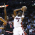 Chicago Bulls Jimmy Butler (21) forces Miami Heat's Dwyane Wade (3) to pass the ball during the first half of a NBA basketball game in Miami, Friday, Jan. 4, 2013. (AP Photo/J Pat Carter)