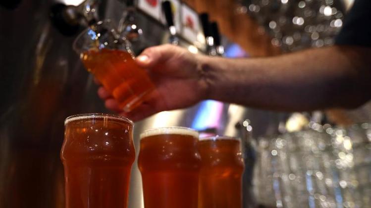 A bartender pours beer on February 7, 2014 in Santa Rosa, California