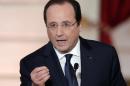 French President Francois Hollande delivers his speech at his annual news conference, Tuesday, Jan.14, 2014 at the Elysee Palace in Paris. The French president's complex personal life — and what it means to be the first lady in modern society — may get a full airing as Hollande answers questions for the first time since a tabloid reported he was having an affair with an actress. (AP Photo/Christophe Ena)