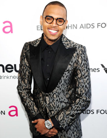 Chris Brown Flirts With Women at Elton John's Oscar Party, Attends Without Rihanna
