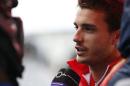 Marussia Formula One driver Bianchi of France speaks to the media after a news conference at the Suzuka circuit