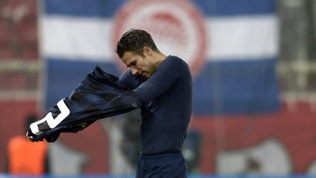 Robin van Persie after Manchester United's defeat to Olympiacos in the Champions League (AFP)