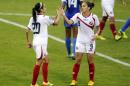 Costa Rica's Wendy Acosta (20) celebrates her goal with Carolina Venegas (9) during the first half of a CONCACAF soccer match against the Martinique, at RFK Stadium, Tuesday, Oct. 21, 2014, in Washington. (AP Photo/Nick Wass)