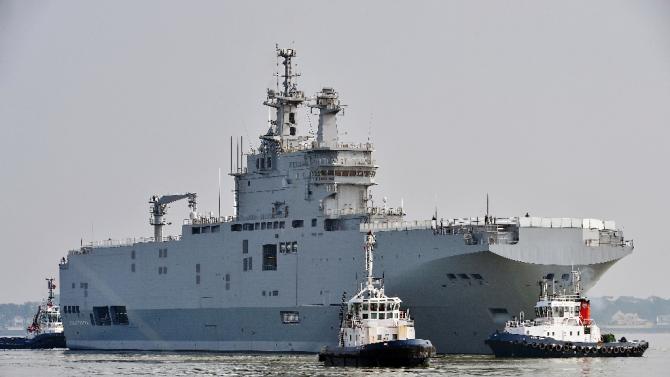 A mistral warship heads out for its first sea trials off Saint-Nazaire, France, on March 16, 2015