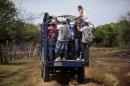 A group of migrants on a truck in Guatemala near border with Mexico on March 28, 2013
