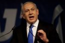 Israel's Prime Minister Benjamin Netanyahu delivers a speech to his Likud party members during the party convention in Tel Aviv, Israel, Sunday, May 6, 2012. Prime Minister Benjamin Netanyahu is expected to announce Sunday night that he'll dissolve parliament to hold early elections, a move designed to fend off domestic critics and perhaps put him in a stronger position to act against Iran.(AP Photo/Ariel Schalit)