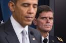 US Special Operations Commander General Joseph Votel (R) as he listens as US President Barack Obama delivers a statement on December 14, 2015