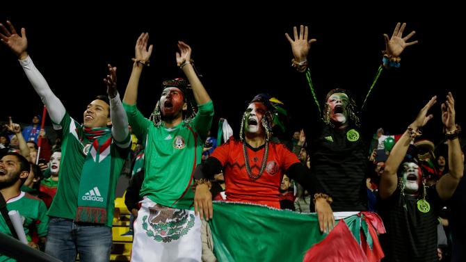Mexican fans cheer their team prior a Copa America Group A soccer match between Mexico and Bolivia at the Sausalito Stadium in Vina del Mar, Chile, Friday, June 12, 2015. (AP Photo/Ricardo Mazalan)
