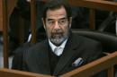 Ousted Iraqi president Saddam Hussein described his 10-month trial as "a comedy" after he was sentenced in 2006