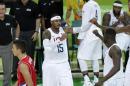 United States' Carmelo Anthony (15) celebrates with teammates after making a basket during a basketball game against Serbia at the 2016 Summer Olympics in Rio de Janeiro, Brazil, Friday, Aug. 12, 2016. (AP Photo/Charlie Neibergall)
