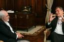 Iranian Foreign Minister Mohammad Javad Zarif talks with Ecuadorean President Rafael Correa at Carondelet Palace in Quito, Ecuador