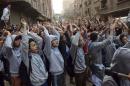 Supporters of Islamist President Mohamed Mursi, who was overthrown by the army after demonstrations against his rule last July, shout slogans during a protest in Omranya area, south of Cairo