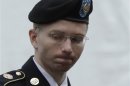 U.S. Army Private First Class Manning enters the courtroom for day four of his court martial at Fort Meade