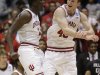 Indiana guard Victor Oladipo (4) and forward Cody Zeller celebrate after they defeated Temple 58-52 in a third-round game of the NCAA college basketball tournament Sunday March 24, 2013, in Dayton, Ohio. (AP Photo/Al Behrman)