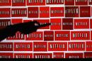 The Netflix logo is shown in this file illustration photograph in Encinitas, California