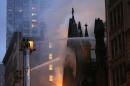 Firefighters battle flames at the historic Serbian Orthodox Cathedral of St. Sava, Sunday, May 1, 2016, in New York. The church that was constructed in the early 1850s and was designated a New York City landmark in 1968. (AP Photo/Kathy Willens)