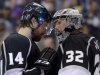 Los Angeles Kings right wing Justin Williams, left, greets goalie Jonathan Quick after their 2-1 win against the San Jose Sharks in Game 7 of the Western Conference semifinals in the NHL hockey Stanley Cup playoffs, Tuesday, May 28, 2013, in Los Angeles.  (AP Photo/Mark J. Terrill)