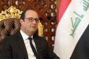 French President Francois Hollande is seen after his arrival at Baghdad Airport in Baghdad, Iraq, Friday, Sept. 12, 2014. Hollande expressed his solidarity with Iraq on a visit to Baghdad on Friday, as his country prepares for possible airstrikes with a U.S.-led coalition against extremists who have seized territory around the region. (AP Photo/Thaier Al-Sudani, Pool)