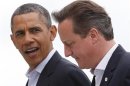U.S. President Barack Obama walks with Britain's Prime Minister David Cameron during the G8 summit at the Lough Erne golf resort in Enniskillen