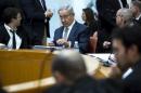 Israeli Prime minister Netanyahu sits in the Supreme Court before he speaks at a hearing about the legality of a government-approved deal to develop Israel's offshore natural gas reserves in Jerusalem