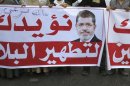 Pro-Mursi protesters chant slogans in support of Egypt's President Mohamed Mursi in Cairo