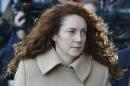 Rebekah Brooks arrives at The Old Bailey law court in London, Monday, Oct. 28, 2013. Former News of the World national newspaper editors Rebekah Brooks and Andy Coulson are due to go on trial Monday, along with several others, on charges of hacking phones and bribing officials while at the now closed tabloid paper.(AP Photo/Kirsty Wigglesworth)