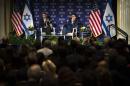 U.S. President Barack Obama speaks with Israeli-American media tycoon Haim Saban in front of a live audience about negotiations with Iran in Washington