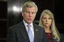FILE - In this Tuesday Jan. 21, 2014 file photo, former Virginia Gov. Bob McDonnell speaks during a news conference in Richmond, Va., accompanied by his wife, Maureen. McDonnell and his wife face federal corruption charges in a trial that begins July 28, 2014. (AP Photo/Steve Helber)