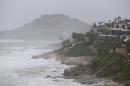 Waves hit the coast of Los Cabos, Mexico, Sunday, Sept. 14, 2014. Hurricane Odile turned into a Category 4 hurricane and it's expected to make a close brush with the southern portion of Mexico's Baja California peninsula Sunday evening. (AP Photo/Victor R. Caivano)