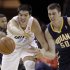 Indiana Pacers' Tyler Hansbrough (50) and Charlotte Bobcats' Byron Mullens (22) chase a loose ball during the first half of an NBA basketball game in Charlotte, N.C., Friday, Nov. 2, 2012. (AP Photo/Chuck Burton)