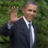 President Barack Obama waves as he walks from the White House in Washington, Friday, May 18, 2012,  to board Marine One, as he travels to Camp David for the G8 Summit. (AP Photo/Carolyn Kaster)