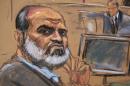 Suleiman Abu Ghaith listens during his trial in a federal court in New York