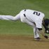 New York Yankees shortstop Derek Jeter injures himself fielding a ball in the 12th inning of  Game 1 of the American League championship series against the Detroit Tigers early Sunday, Oct. 14, 2012, in New York. (AP Photo/Kathy Willens)