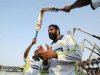 Pakistan's cricket playerspay respect to Inzamam-ul-Haq (C) on the fifth day of their second test cricket match against South Africa in Lahore