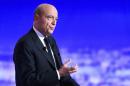 French politician Alain Juppe attends the first prime-time televised debate for the French conservative presidential primary in La Plaine Saint-Denis, near Paris