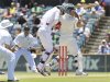 Australia's Ponting knicks the ball to South Africa's Kallis at the WACA in Perth during the fourth day's play of the third cricket test match