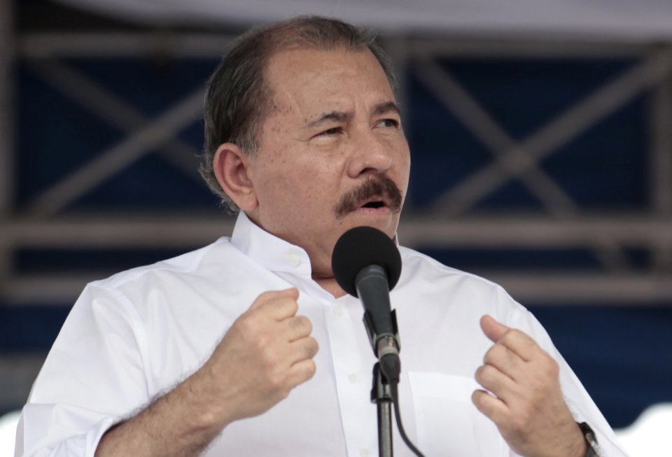 Nicaragua's President Daniel Ortega speaks during a ceremony marking the 34th anniversary of the withdrawal to Masaya, a tactical move by the Sandinistas that was critical in the overthrow of Anastasio Somoza's dictatorship in 1979, in Managua, Nicaragua, Friday, July 5, 2013. The presidents of Nicaragua and Venezuela offered Friday to grant asylum to NSA leaker Edward Snowden, one day after leftist South American leaders gathered to denounce the rerouting of Bolivian President Evo Morales' plane over Europe amid reports that the American was aboard. (AP Photo/Lucia Silva)