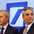 CEOs of Deutsche Bank Anshu Jain, right, and Juergen Fitschen stand together prior to the beginning of a press conference in Frankfurt, Germany, Tuesday, Sept. 11, 2012. The Deutsche Bank announced its strategy and ambition for the next years. (AP Photo/Michael Probst)