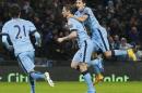 Manchester City's English midfielder Frank Lampard (2nd R) celebrates scoring a goal teammates during a match aginst Sunderland in Manchester, England, on January 1, 2015