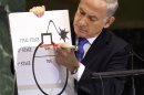 Prime Minister Benjamin Netanyahu of Israel shows an illustration as he describes his concerns over Iran's nuclear ambitions during his address to the 67th session of the United Nations General Assembly at U.N. headquarters Thursday, Sept. 27, 2012. (AP Photo/Seth Wenig)