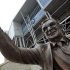 A statue of former Penn State Football coach Joe Paterno stands outside Beaver Stadium on the Penn State campus Wedneday, July 11, 2012, in State College, Pa. The results of Penn State's internal investigation into the Jerry Sandusky scandal are set to be released Thursday in a report that should answer many of the questions swirling around one of the worst scandals in sports history. A team led by former federal judge and FBI ex-director Louis Freeh interviewed hundreds of people to learn how the university responded to warning signs that its once-revered former assistant football coach--a man who helped Paterno win two national titles for a university that touted "success with honor"--was a serial child molester. (AP Photo/Gene J. Puskar)