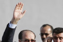 Iraq's Prime Minister Nouri al-Maliki greets supporters following a campaign rally in Basra, Iraq's second-largest city, 340 miles (550 kilometers) southeast of Baghdad, Iraq, Monday, April 15, 2013. Al-Maliki resumed his election campaign after the early voting for security forces in the country's provincial elections. (AP Photo/ Nabil al-Jurani)