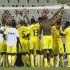Togo's players celebrate getting through to the next round after drawing their African Nations Cup (AFCON 2013) Group D soccer match against Tunisia in Nelspruit