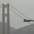 A Navy Blue Angels F/A-18 flies past the Golden Gate Bridge in San Francisco, Thursday, Oct. 4, 2012.  The Blue Angels were practicing for the annual Fleet Week celebration this weekend. (AP Photo/Eric Risberg)