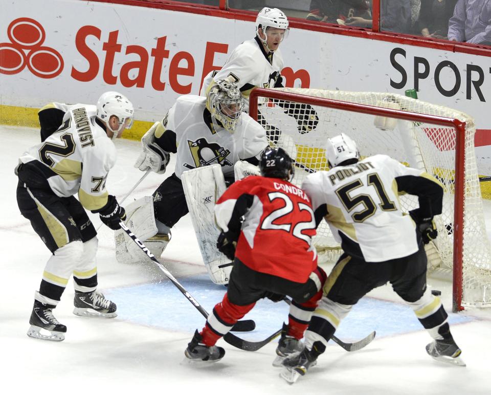 Stone scores winner in OT to lift Senators past Penguins